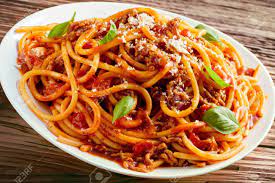 Who doesn't have dried spaghetti in the pantry at all times? Plate Of Traditional Spaghetti Bolognese Or Bolognaise With A Spicy Beef And Tomato Sauce Topped With Parmesan Cheese And Garnished With Basil Stock Photo Picture And Royalty Free Image Image 77198117