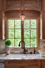 Natural light, electric lighting and interior colours are three distinctly connected elements. Lighting Over Kitchen Sink Houzz