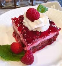 A la carte salad for the holiday table with a small surprise inside. Raspberry Layered Jello Salad Norine S Nest