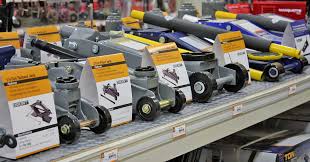 Two post hoists for automotive workshops. Safe Vehicle Lifting Car Jack And Jack Stands Guide Napa Know How Blog