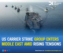 A US aircraft carrier and its accompanying warships have arrived in the Middle  East, according to two US officials, marking a significant expansion of the  United States' military presence in the region