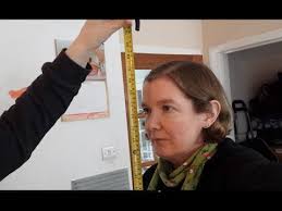 Grab a piece of string — or a shoelace, if necessary — wrap it around your wrist, and mark off where the string comes together. How To Measure Height With A Tape Measure And No Wall Youtube