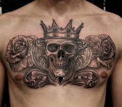 Skull With Crown Tattoo Roses Tattoo Chest Piece Chest Tattoo Black And Grey Realism Tattoo Tattoos For Guys Cool Chest Tattoos Skull With Crown Tattoo