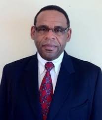 As his wife Casey and children look on, James Clinch is formally sworn in  as the new Venice City Manager by City Clerk Kelly Michaels during  Tuesday's Council meeting, with an assist
