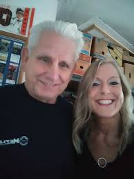 This is a follow-up photo about Carl's Cash Market. On the left is Carl  Lusikka shaking hands with Tim Smith, the new owner. Carl & Helvi Lusikka  owned the store from 1952-1969.