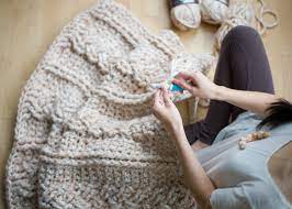 If you crochet you must check out this gorgeous crochet cabled blanket by stephanie at all about ami!! Chunky Braided Cabled Blanket All About Ami