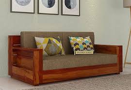 the marriott 2 seater wooden sofa in dashing honey finish is an alluring piece of furniture the two seater s living room sofa design sofa set sofa set designs
