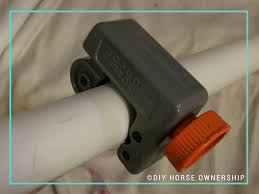 My horse barn is a compact space, with enough room to tie two horses for harnessing or saddling as the rest of the space has been converted to goat pens. Diy How To Make A Swiveling Pvc Saddle Pad Rack Diy Horse Ownership