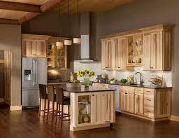 The space appears larger with high cabinets, bright lights the light wood of these floors and cabinets balances the bold wall colors and dark countertops. Hickory Kitchen Cabinets Rustic Kitchen Cabinets Hickory Kitchen