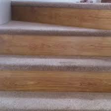After Photo Of Stairs Using Carpet Remnants On Treads Left Over Wood Laminate On Risers Carpet Remnants Laminate Stairs Wood Laminate