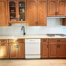 Oak Cabinets With Cream Subway Tiles Dark Grout Kitchenremodelwithoakcabinets Kitchen Renovation Oak Kitchen Remodel Kitchen Remodel Small