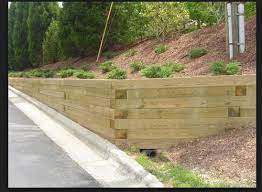 6 X 6 X 8 Treated Landscape Timber At Menards Landscaping Retaining Walls Backyard Retaining Walls Landscape Timbers