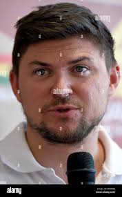 Czech pilot of a rally car Martin Prokop speaks during the press conference  after his return