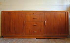 Features two sculpted handles on each side and original. Danish Modern Teak Credenza Phylum Furniture
