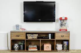 When your tv overpowers your room, give it a taste of its own medicine. 18 Stunning Ways To Decorate Around A Tv Twelve On Main