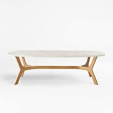 63 1/4w x 35 3/4d x 16 1/4h shown in standard architectural bronze frame clear glass top and clear mirror bottom shelf standard. Elke Rectangular Glass Coffee Table With Brass Base Reviews Crate And Barrel