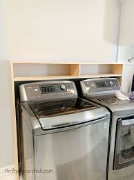 The easiest diy laundry room shelf over washer dryer. Easy Diy Laundry Shelf Over Washer And Dryer Thrifty Decor Chick