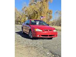 Image result for Bright Red 2004 Pontiac
