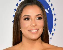 After posting a dazzling pink swimsuit photo earlier this week, yesterday she posted one of herself in a white swimsuit, someplace beachy and exotic. Eva Longoria Is Soaking Up Vacation With Son Killing It In Bikini Pics
