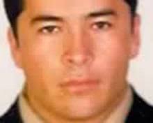 Woman's decapitation linked to web posts about Mexican drug cartel