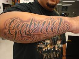 You can either try a faller angel or even better a guardian anger tattoo on upper arm. Arm Name Tattoos Google Search Names Tattoos For Men Arm Tattoos For Guys Tattoos For Guys
