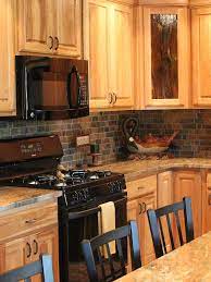 Read this post further to find the 11 attractive inspirations that you can use in your next project. Rusty Brown Slate Mosaic Backsplash Tile For Traditional Kitchen