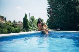 Two Lesbian Women Having Fun In Swimming Pool One Summer Afternoon Stoc Ad Fun Swimming Lesbian Women Ad Piscina