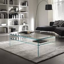 A glass top coffee table is an easy way to create a trendy look. Contemporary Coffee Tables Ultra Modern