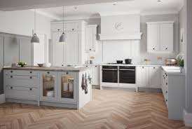 By integrating the fridge and installing a ceramic undermount sink, the kitchen will feel more open. Kitchen Collection Roundel