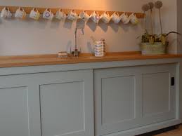 Very Large Sliding Door Sink Unit With Peg Rail Above Glass Kitchen Cabinet Doors Glass Kitchen Cabinets Kitchen Cabinet Doors