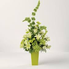 Bouquet of white daisies, yellow carnations, orange roses in a glass vase. Bells Of Beauty Eden Florist South Florida Flowers For Any Occasion