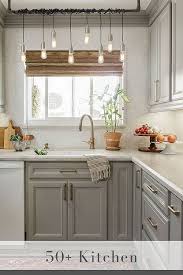 For instance, if you choose to use varying shades of beige as the basis of your design, you'll want at least two shades of beige, and you'll likely want a brown or white to add. 50 Light Gray Kitchen Cabinets Cool Moody Grey Cabinets