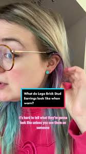 Replying to @Andrea 🌟 how do the lego brick stud earrings look when worn?  These are a very versatile pair of stud earrings. They add a pop of colour  to any look. If you have double lobe piercings then ...