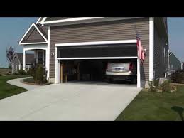 retractable garage screen for single double and golf cart garages these screens can be manual or motori garage screen door garage doors garage door makeover