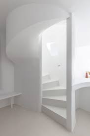 Grey kitchen color will make our kitchen look expensive and luxury. Kapsimalis Architects Refurbishes Santorini Cave House