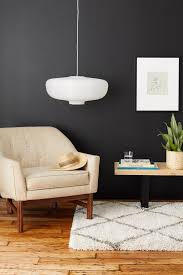 Black Accent Wall Living Room How To Pull Off A Matte Black Accent Wall While Keeping Your Space Nice And Bright Black Accent Wall Living Room Black Accent Walls Black Painted Walls