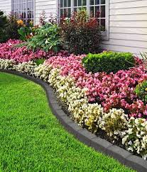 Use big stones with almost similar sizes to create a walled effect. Grey Garden Border In Roman Stone Safer Surfacing