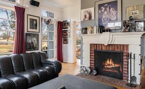 If you've got an old fashioned, rustic red brick fireplace but want to modernize it a little bit consider installing a wood mantel. Red Brick Fireplace Ideas Beautiful Fireplace Designs