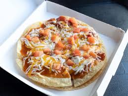 Taco Bell is making the Mexican Pizza $1 for a day. I tried the fan-favorite item, and it's worth the hype.