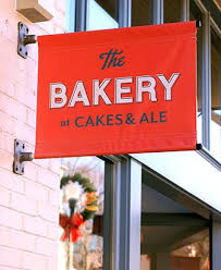 Green Olive Media Cakes Ale The Bakery At Cakes Ale Restaurant Signage Business Signage Signage