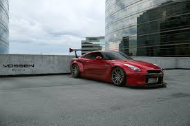 Red Lowered Nissan Gt R Goes Wild With Custom Body Kit Nissan Gtr Nissan Gtr Wallpapers Nissan Gt R