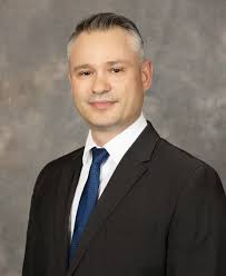 Trustee Jimi Psarakis