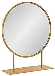 Amazon Com Kate And Laurel Rouen Modern Glam Round Metal Frame Table Mirror With Stand Gold In 2020 Mirror Table Gold Living Room Furniture Slipper Chair Living Room