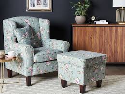 Furniture design history why do wingback chairs have wings. Fabric Wingback Chair With Footstool Floral Pattern Green Hamar Beliani Fr