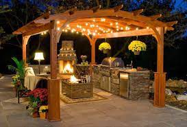Interesting to have the fireplace. Outdoor Kitchen Ideas For Better Backyard Living With Natural Stone