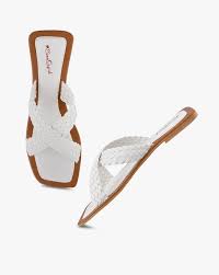 Throw on a denim jacket on a moderately cool day for an effortlessly chic look and for colder days choose from our wide range of leather jackets to keep it stylish, warm and comfortable. Buy White Flat Sandals For Women By Everqupid Online Ajio Com