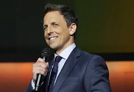 Mulaney, in turtleneck and mutton chops, plays a composer strongly resembling mr. Seth Meyers To Host All Star Night Of Comedy Against Trump Policies Deadline