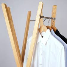 Doing delicates never looked so good. Collapsable Design Clothes Rack Made Of Solid Wood Kunstbaron