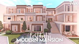The back yard is home to a picnic area, grill, and very beautifully landscaped plants that make it feel alive but spacious. Aesthetic Modern Mansion Bloxburg Build Youtube