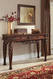 North shore dining room extension table is masterful enough for a king's table, minus the king's ransom to own. North Shore Sofa Console Table Ashley Furniture Homestore
